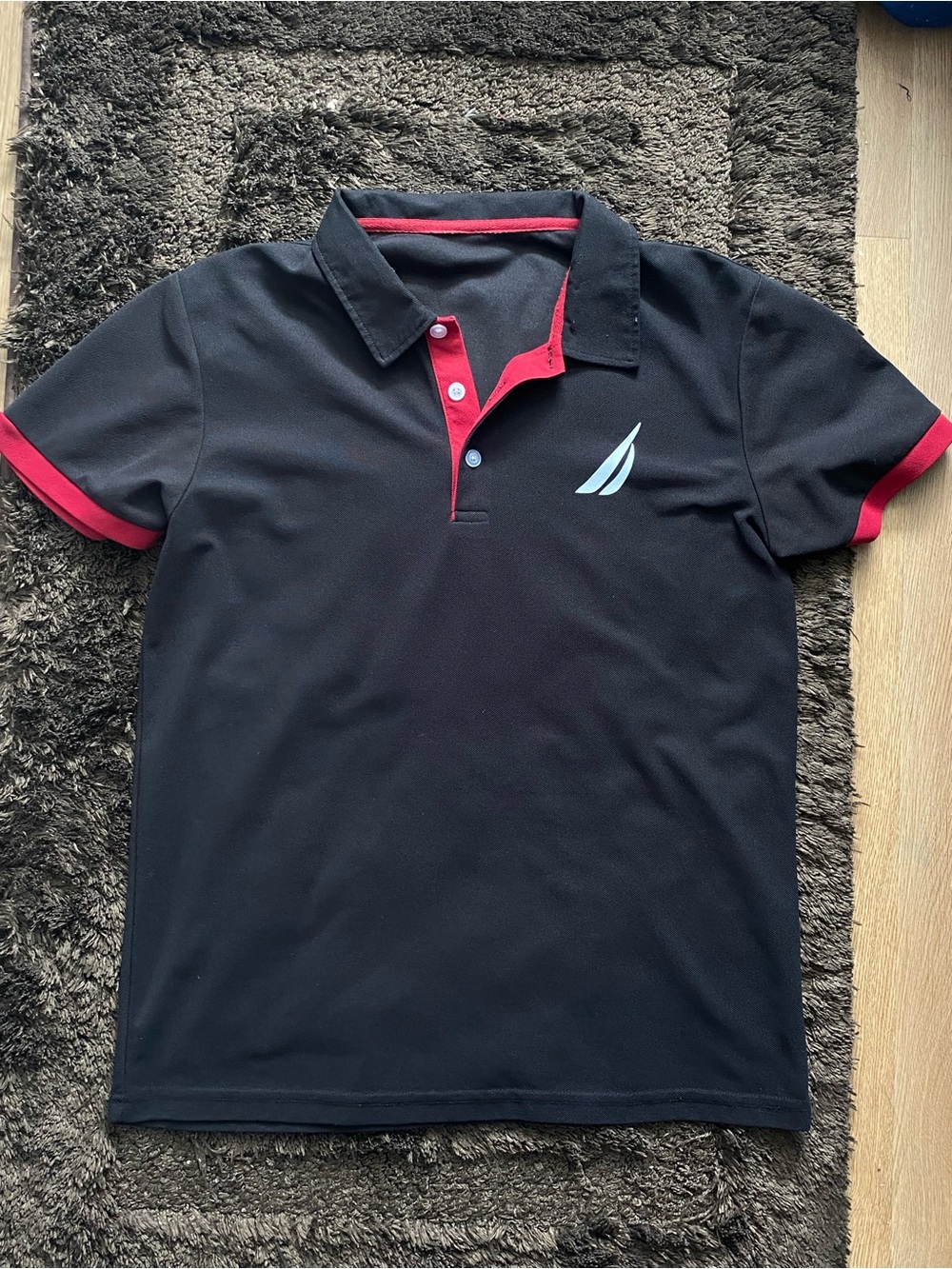 Nautica Black Polo with Red Trim and White Sail Logo